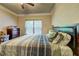Relaxing bedroom featuring a large window and comfortable carpet at 5280 Clingman Ct, Douglasville, GA 30135