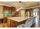 Elegant kitchen with a spacious island, granite countertops, and stainless steel appliances at 5280 Clingman Ct, Douglasville, GA 30135