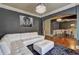 Comfortable living room with white sofa, connecting to formal dining area at 5280 Clingman Ct, Douglasville, GA 30135