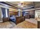 Spacious main bedroom with a dark accent wall and luxurious carpet at 5280 Clingman Ct, Douglasville, GA 30135
