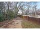 Backyard featuring a gravel area and brick walls at 125 Laurel Sw Ave, Atlanta, GA 30314