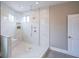 Modern bathroom with tiled walk-in shower, bench seating, and sleek fixtures at 125 Laurel Sw Ave, Atlanta, GA 30314