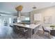 Bright kitchen with a large center island, stainless steel appliances, and an adjacent dining area at 125 Laurel Sw Ave, Atlanta, GA 30314