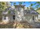 The back of the house features a private backyard, offering a peaceful outdoor retreat and space for activities at 432 Tanner Farm Dr, Rockmart, GA 30153