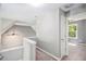 Upstairs hallway featuring carpet, a ceiling fan, and a view into a bedroom at 432 Tanner Farm Dr, Rockmart, GA 30153