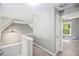 Upstairs hallway with a view to a carpeted bedroom at 432 Tanner Farm Dr, Rockmart, GA 30153