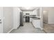 Kitchen with white cabinets and black appliances at 432 Tanner Farm Dr, Rockmart, GA 30153