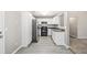 Efficient kitchen layout with stainless appliances and ample cabinet space at 432 Tanner Farm Dr, Rockmart, GA 30153