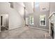 Bright living room with vaulted ceilings and a stone fireplace at 432 Tanner Farm Dr, Rockmart, GA 30153
