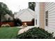 Charming backyard with a brick patio and firepit, ideal for outdoor gatherings and relaxation at 4406 Dickens Nw Ct, Kennesaw, GA 30144