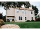 Expansive backyard showcasing a well-manicured lawn and a patio area perfect for relaxing or entertaining at 4406 Dickens Nw Ct, Kennesaw, GA 30144