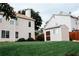 Spacious backyard featuring a storage shed and a lush green lawn perfect for outdoor activities at 4406 Dickens Nw Ct, Kennesaw, GA 30144