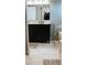Bathroom features a vanity with granite countertop, dark wood cabinetry and a large mirror at 4406 Dickens Nw Ct, Kennesaw, GA 30144