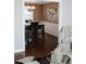 Open-concept dining area with modern table and chairs visible from the living room at 4406 Dickens Nw Ct, Kennesaw, GA 30144