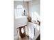 Bright foyer with a chandelier, large window, and decorative elements at 4406 Dickens Nw Ct, Kennesaw, GA 30144