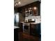 Kitchen featuring stainless steel appliances, granite countertops, and dark wood cabinets at 4406 Dickens Nw Ct, Kennesaw, GA 30144