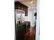 The updated kitchen has stainless steel appliances and dark wood cabinetry at 4406 Dickens Nw Ct, Kennesaw, GA 30144