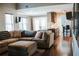 An open-concept living room with a bar, a living area and a TV on the wall at 4406 Dickens Nw Ct, Kennesaw, GA 30144