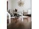 Inviting living area featuring hardwood flooring and unique decorative pieces at 4406 Dickens Nw Ct, Kennesaw, GA 30144