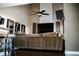 Comfortable living room with a ceiling fan and large television screen at 4406 Dickens Nw Ct, Kennesaw, GA 30144