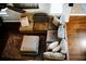 Overhead view of a living room with a sectional sofa and hardwood floors at 4406 Dickens Nw Ct, Kennesaw, GA 30144