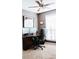 Functional home office with dark wood desk, dual monitors, and comfortable chair, ideal for remote work at 4406 Dickens Nw Ct, Kennesaw, GA 30144