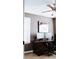 Inviting home office featuring a dark wood desk and dual monitors, perfect for a productive workspace at 4406 Dickens Nw Ct, Kennesaw, GA 30144