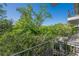 Balcony overlooking lush greenery with blue skies at 3203 Lenox Ne Rd # 32, Atlanta, GA 30324