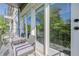 Relax on the balcony featuring outdoor seating to enjoy peaceful view of surrounding trees and landscaped gardens at 3203 Lenox Ne Rd # 32, Atlanta, GA 30324