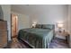 Relaxing bedroom boasts a comfortable bed, soft lighting, and seamless access to ensuite bathroom at 3203 Lenox Ne Rd # 32, Atlanta, GA 30324