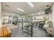 Gym area equipped with workout equipment, weights and mirrors at 3203 Lenox Ne Rd # 32, Atlanta, GA 30324