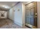 Well-maintained condo hallway featuring patterned carpeting and unit entrance doors at 3203 Lenox Ne Rd # 32, Atlanta, GA 30324