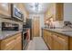 Efficient kitchen with stainless appliances, granite counters, and ample cabinet space at 3203 Lenox Ne Rd # 32, Atlanta, GA 30324
