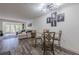 Open living area with a comfortable sectional sofa, access to a balcony, and stylish decor at 3203 Lenox Ne Rd # 32, Atlanta, GA 30324