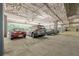 View of parking garage with assigned parking spots and overhead pipes at 3203 Lenox Ne Rd # 32, Atlanta, GA 30324