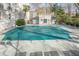 Outdoor pool area, partially covered, surrounded by lounge chairs and greenery at 3203 Lenox Ne Rd # 32, Atlanta, GA 30324