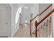 Bright entryway featuring a staircase, neutral paint, and luxury vinyl plank flooring at 3447 Dogwood Pass, Lithonia, GA 30038