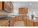 Beautiful kitchen with a gas range, stainless appliances, ample counter space, and an island at 3447 Dogwood Pass, Lithonia, GA 30038