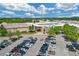 Aerial view of the Stonecrest Mall with parking and surrounding trees at 3447 Dogwood Pass, Lithonia, GA 30038