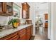 Butler's pantry offers extra counter space and storage, conveniently located off the kitchen at 1227 Magnolia Path Way, Sugar Hill, GA 30518