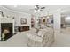 Basement living room showcasing a fireplace and wet bar, perfect for entertaining at 1227 Magnolia Path Way, Sugar Hill, GA 30518