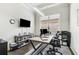 Bright modern office space featuring a large desk, computer, and ample storage at 1227 Magnolia Path Way, Sugar Hill, GA 30518