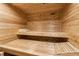Inviting cedar sauna with built-in benches, perfect for relaxation and wellness at 1227 Magnolia Path Way, Sugar Hill, GA 30518