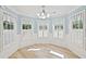 Bay window dining area with hardwood floors and light blue walls at 1315 Pembridge Nw Way, Kennesaw, GA 30152
