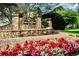 Remington Ridge stone entrance monument sign surrounded by vibrant flowerbeds at 1315 Pembridge Nw Way, Kennesaw, GA 30152