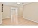 Bright living room with hardwood floors and neutral paint, offers a smooth transition to adjacent rooms at 1315 Pembridge Nw Way, Kennesaw, GA 30152