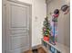 Mudroom features custom bench and storage adjacent to entrance at 4241 Woodward Walk Ln, Suwanee, GA 30024