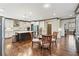 Bright kitchen with stainless appliances, custom cabinets and granite countertops at 4241 Woodward Walk Ln, Suwanee, GA 30024