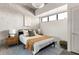 Cozy bedroom featuring a modern bed, stylish decor, and ample natural light at 480 John Wesley Dobbs Ne Ave # 716, Atlanta, GA 30312