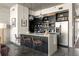 Modern kitchen with sleek cabinetry, pendant lights, stainless steel appliances, and bar stools at 480 John Wesley Dobbs Ne Ave # 716, Atlanta, GA 30312